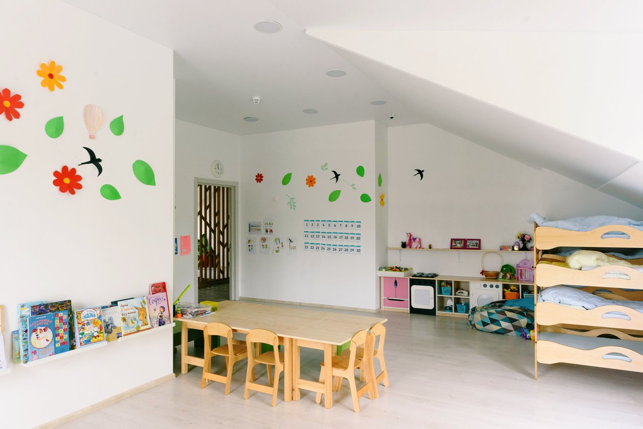 Kids Playroom with Wooden Tables and Bunk Bed